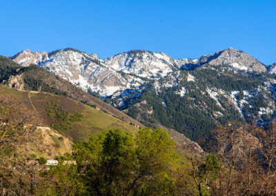 Wasatch mountains and foothills in the spring with snow on the peaks