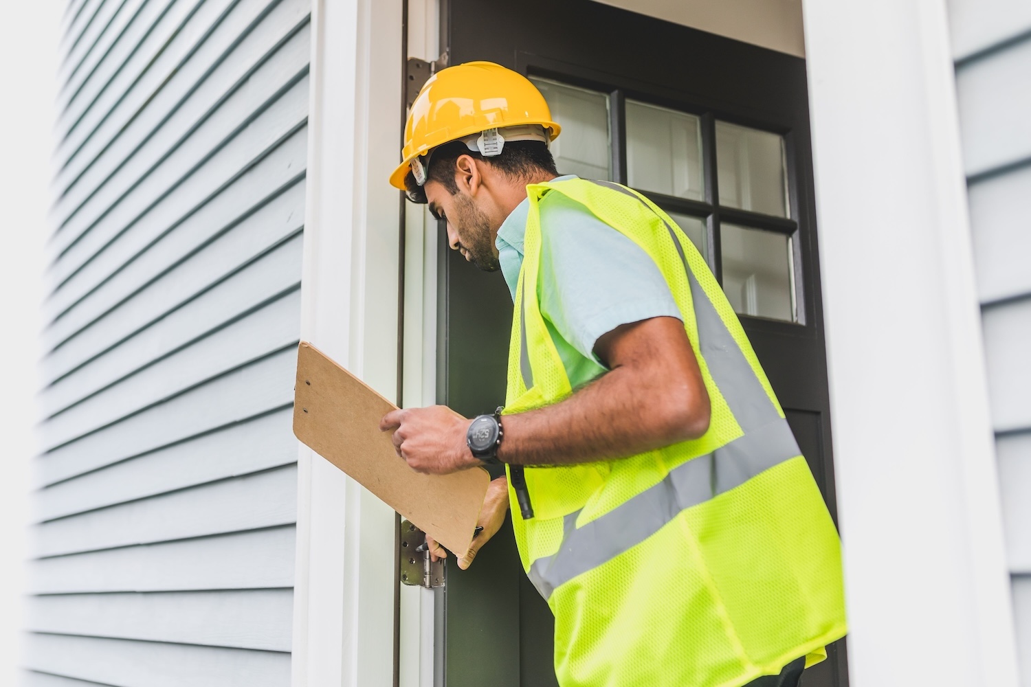Home inspector evaluating a property during a real estate transaction in Utah